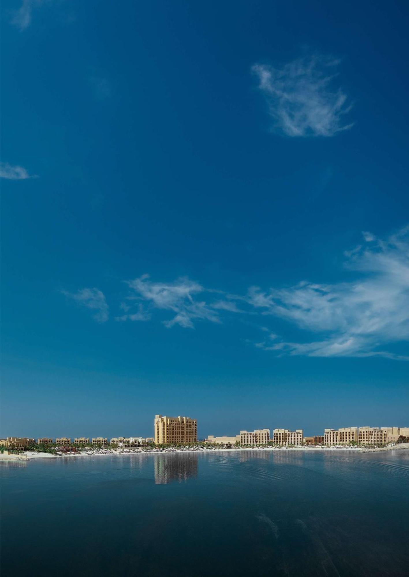 Doubletree By Hilton Resort & Spa Marjan Island Рас ал Хайм Екстериор снимка The blue sky over the city